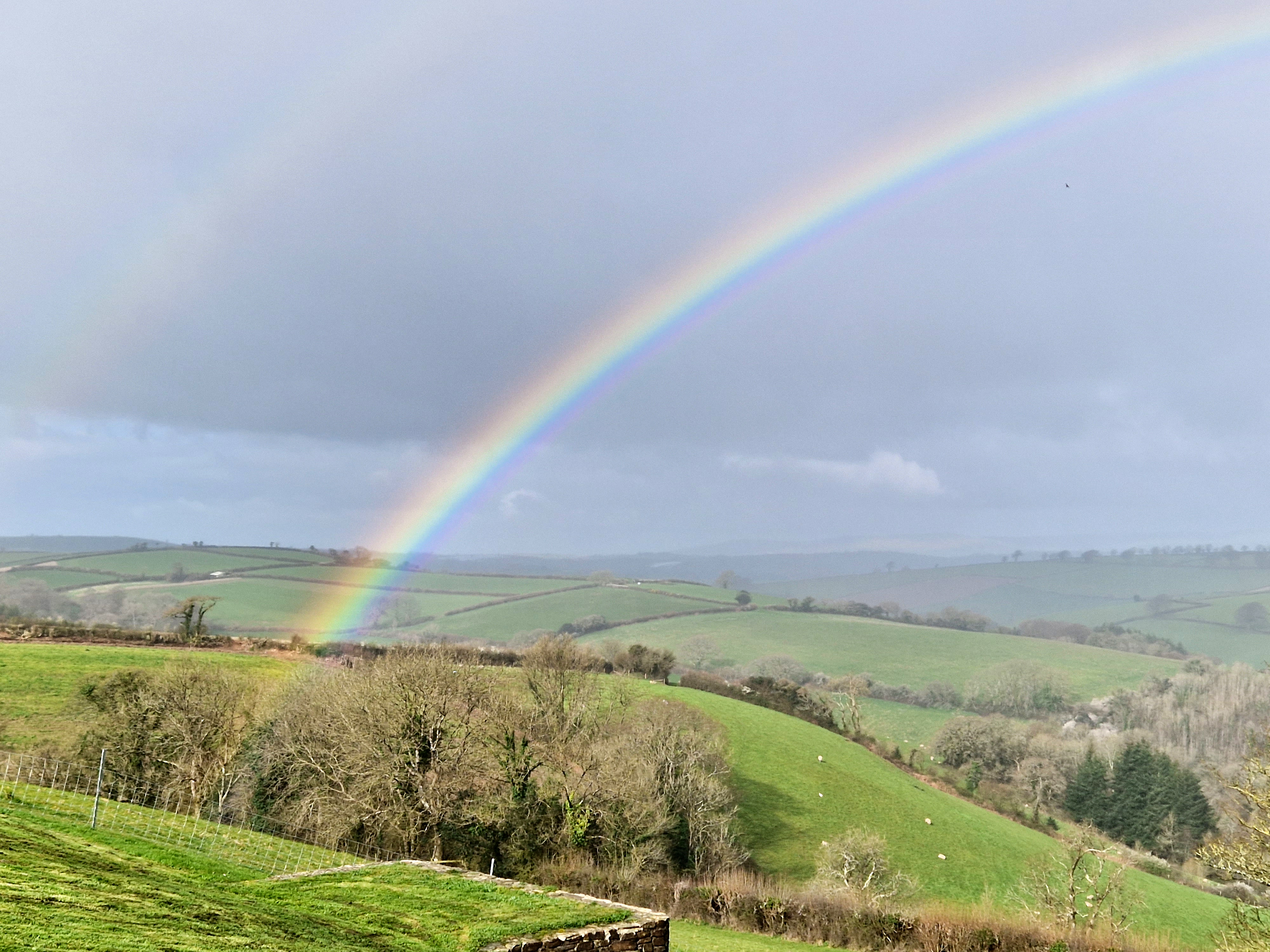Rainbow n the view towards Dartmoor